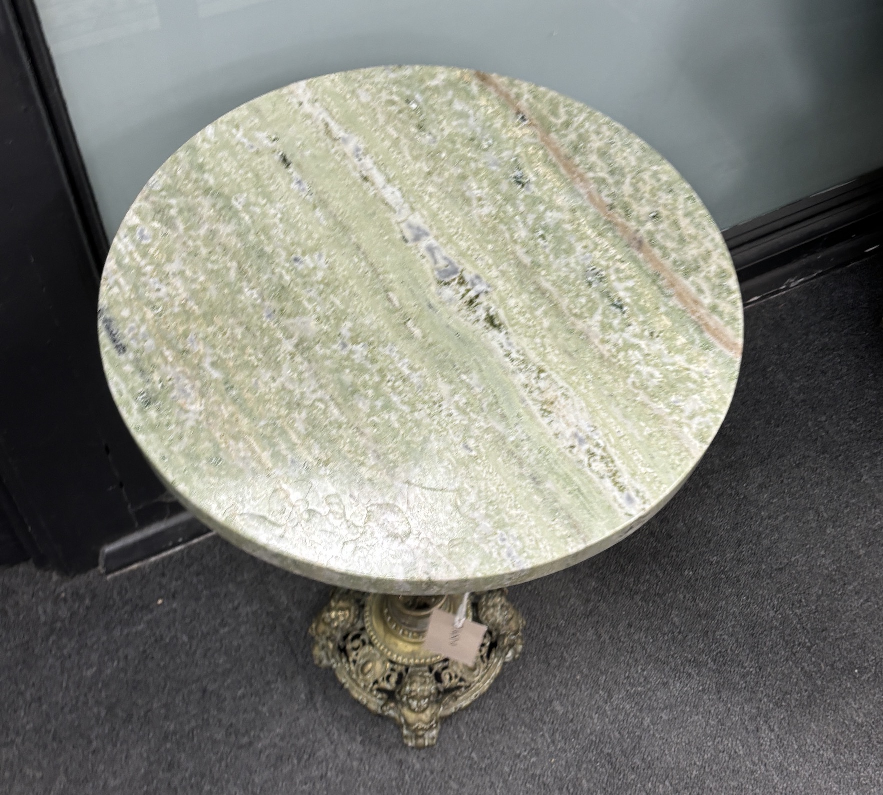 A circular marble and gilt brass occasional table, diameter 40cm, height 60cm